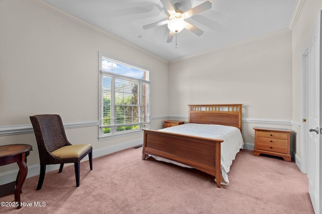bedroom with baseboards, crown molding, light colored carpet, and ceiling fan