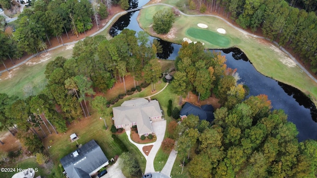 bird's eye view with view of golf course and a water view