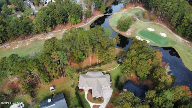 aerial view featuring view of golf course and a water view
