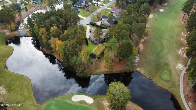bird's eye view with golf course view, a residential view, and a water view