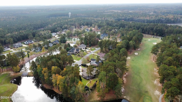 birds eye view of property featuring a wooded view, a residential view, golf course view, and a water view