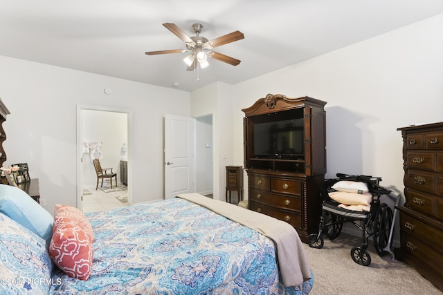 bedroom with a ceiling fan and light carpet