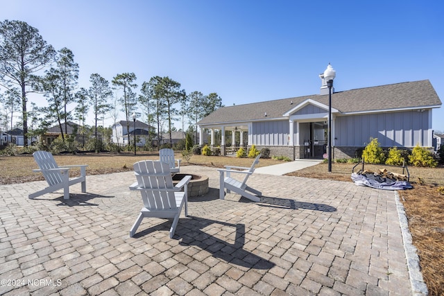 view of patio featuring a fire pit