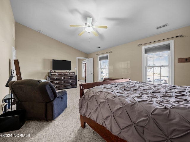 bedroom featuring ceiling fan, carpet floors, and lofted ceiling