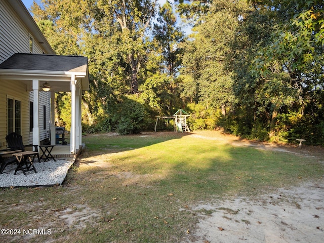 view of yard featuring a playground