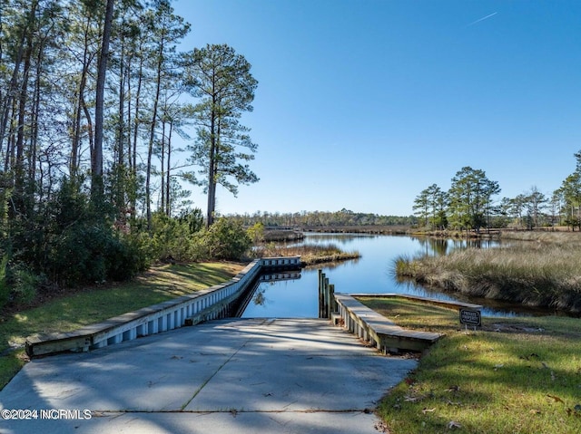 dock area featuring a water view