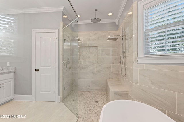 bathroom featuring vanity, ornamental molding, and a shower with door