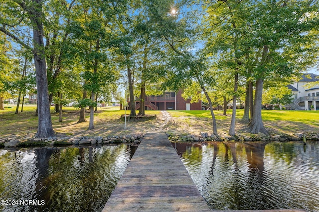 dock area featuring a water view