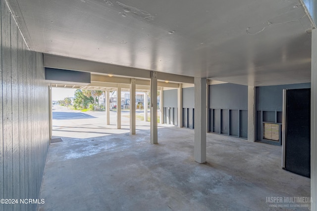 garage with wood walls