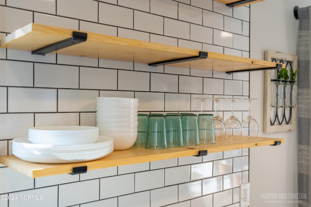 details featuring backsplash and butcher block countertops