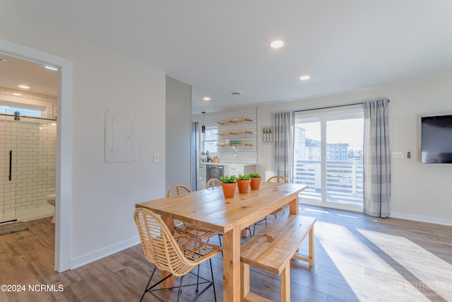 dining area featuring light hardwood / wood-style floors and sink