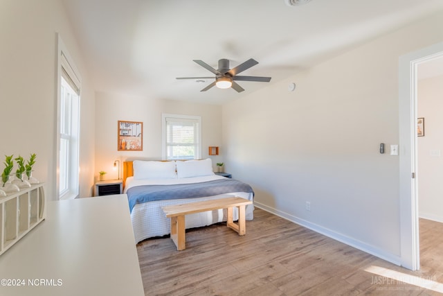 bedroom featuring ceiling fan and light wood-type flooring