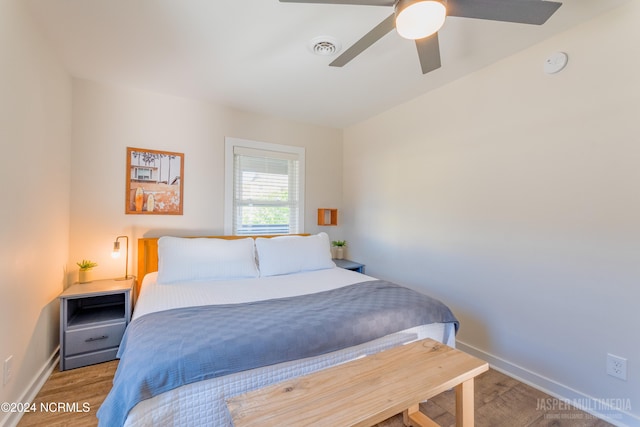 bedroom featuring wood-type flooring and ceiling fan