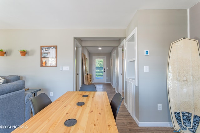 dining room featuring dark wood-type flooring