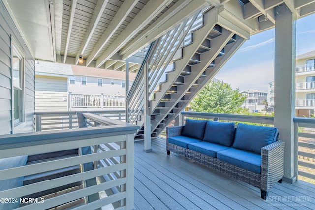 deck featuring outdoor lounge area