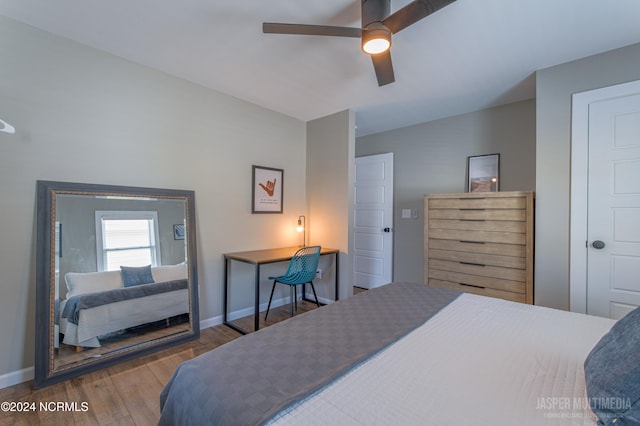 bedroom featuring wood-type flooring and ceiling fan