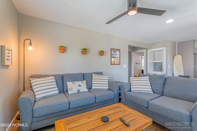 living room featuring ceiling fan