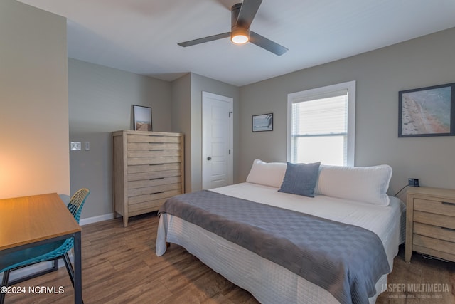 bedroom featuring ceiling fan and hardwood / wood-style flooring