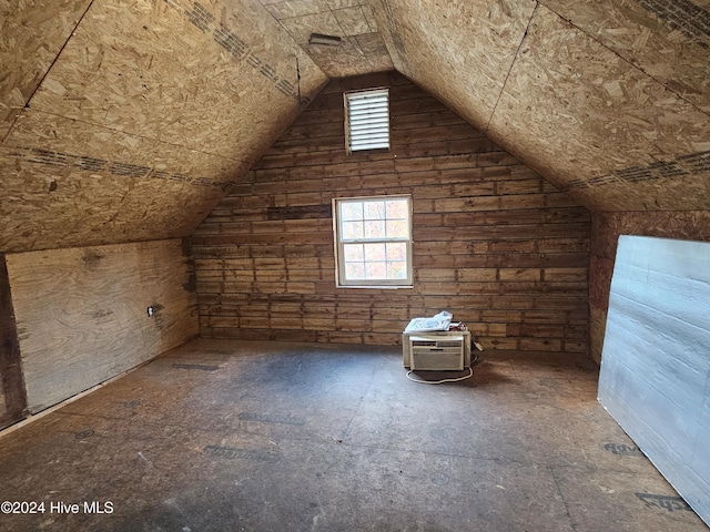 bonus room featuring vaulted ceiling