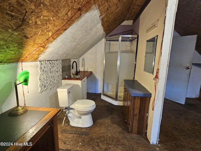 bathroom with vanity, lofted ceiling, an enclosed shower, and toilet