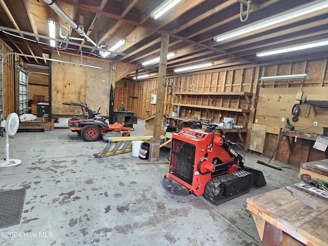 garage featuring a workshop area