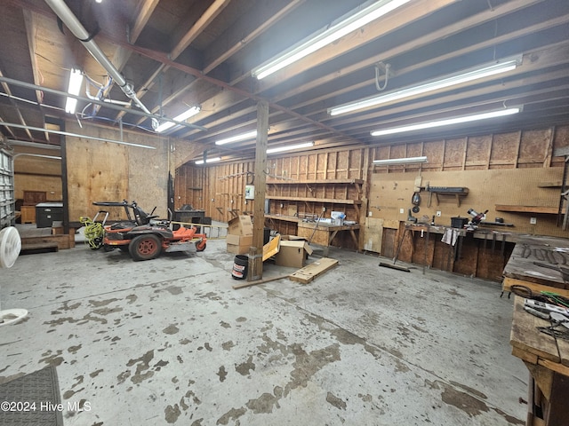 garage featuring a workshop area