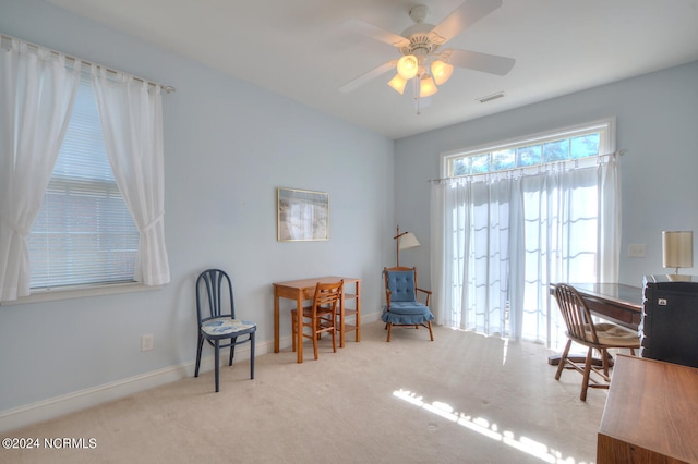 office area with light carpet and ceiling fan