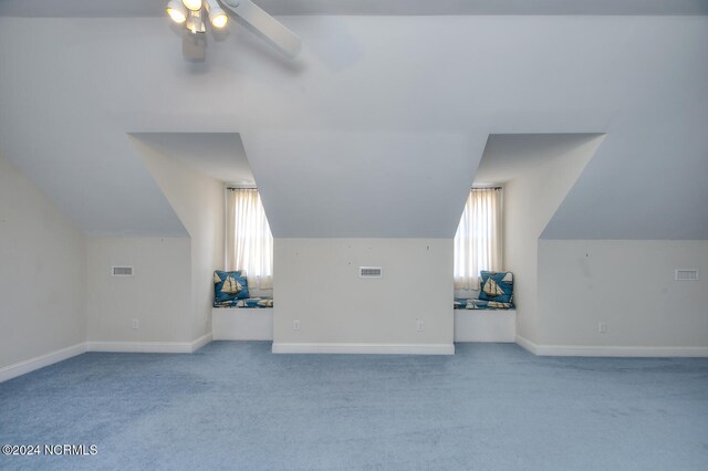 4315 Loblolly Cir SE, Southport, NC 28461 - bonus room with lofted ceiling, healthy amount of natural light, carpet flooring, and ceiling fan