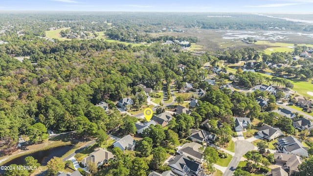 4315 Loblolly Cir SE, Southport, NC 28461 - aerial view of property's location with a large body of water, a heavily wooded area, and nearby suburban area