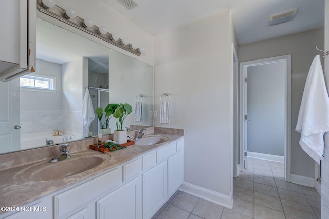 bathroom with vanity, shower with separate bathtub, and tile patterned floors