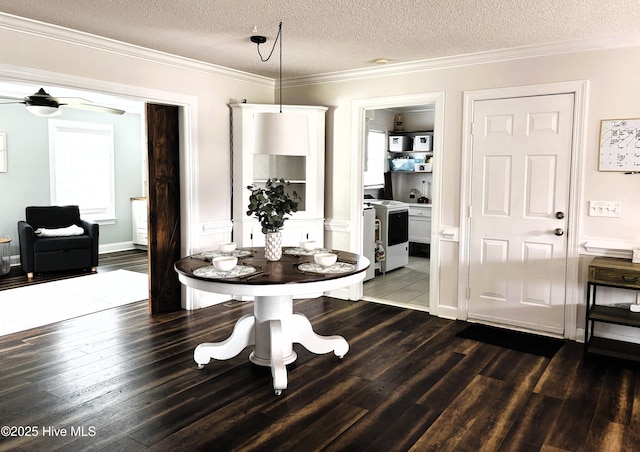 117 Buds Ln, Cedar Point, NC 28584 - dining space featuring dark wood-style flooring, a textured ceiling, crown molding, and ceiling fan