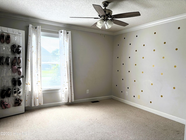 117 Buds Ln, Cedar Point, NC 28584 - carpeted spare room with ornamental molding, a textured ceiling, and a ceiling fan