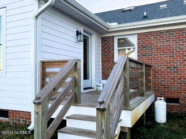 117 Buds Ln, Cedar Point, NC 28584 - doorway to property featuring crawl space