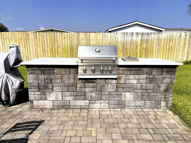 117 Buds Ln, Cedar Point, NC 28584 - view of patio with an outdoor kitchen