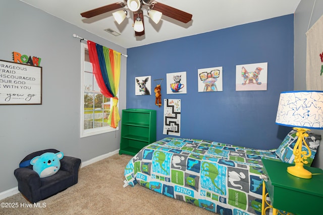 carpeted bedroom featuring ceiling fan