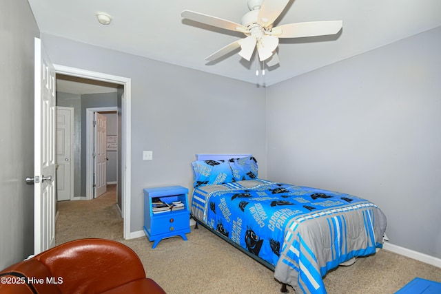 bedroom with ceiling fan and carpet flooring