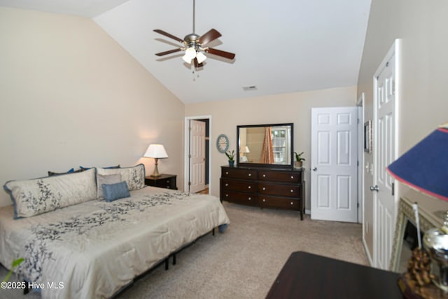 carpeted bedroom with lofted ceiling and ceiling fan