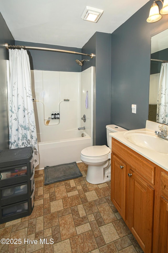 full bathroom with vanity, toilet, and shower / bathtub combination with curtain