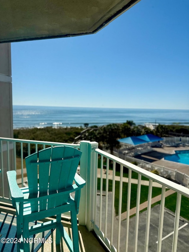 balcony featuring a water view