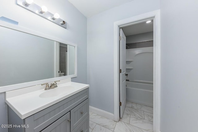 bathroom featuring vanity and washtub / shower combination