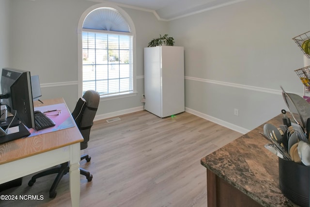 office area featuring crown molding and light wood-type flooring