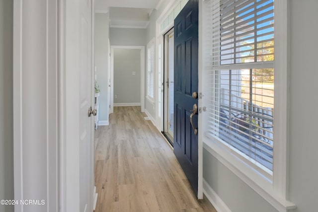 corridor featuring light hardwood / wood-style floors