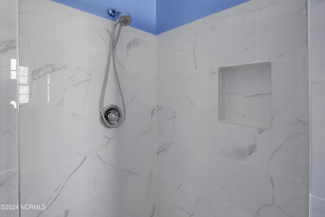 room details with a tile shower