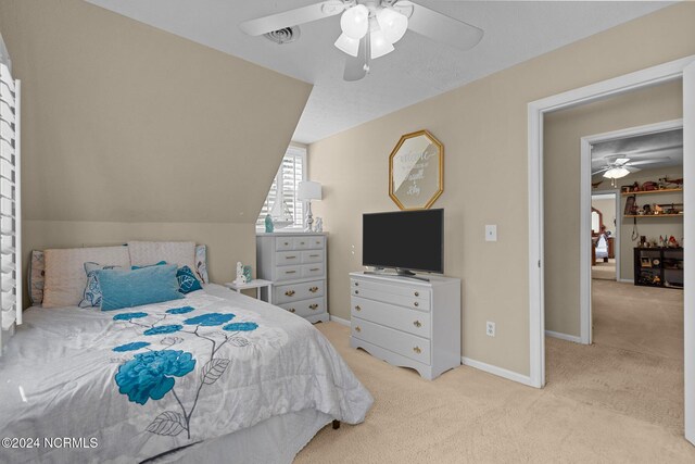 bedroom with light wood-type flooring and ceiling fan