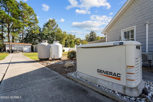 exterior details with heating fuel, fence, and a power unit