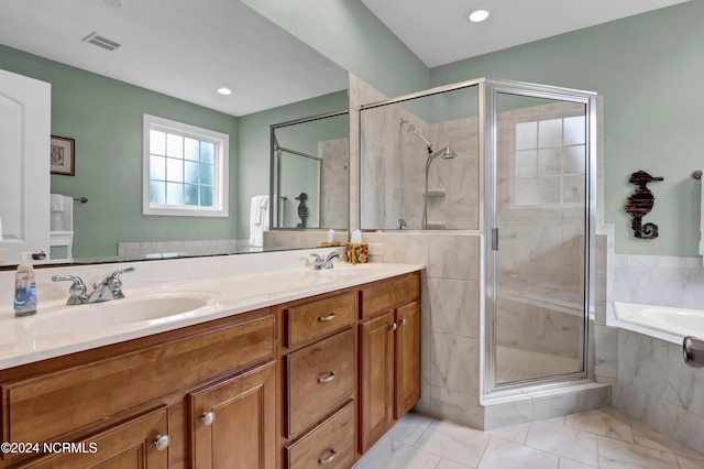 bathroom with vanity and plus walk in shower