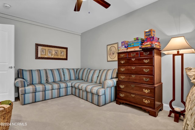 carpeted living room with lofted ceiling and ceiling fan