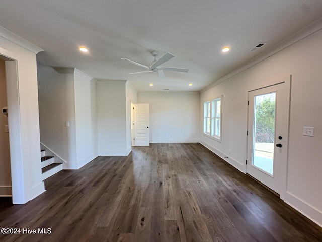 interior space featuring dark hardwood / wood-style floors, ceiling fan, and ornamental molding