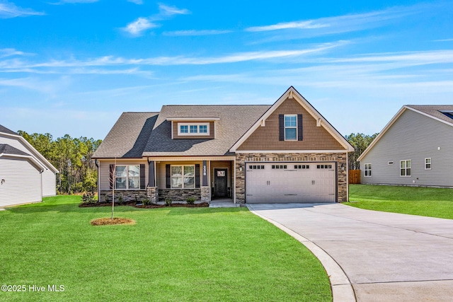 craftsman-style house featuring stone siding, a front lawn, and concrete driveway