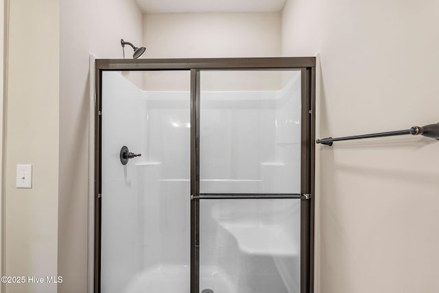 bathroom featuring a stall shower